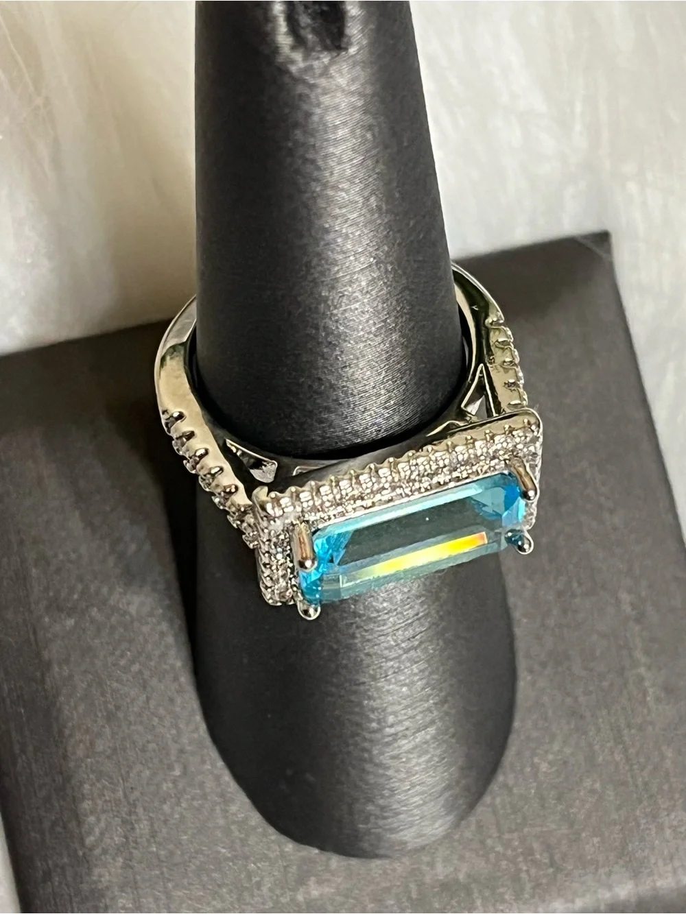 East To West Emerald Cut Aquamarine Ring